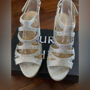 Shiny silver heels